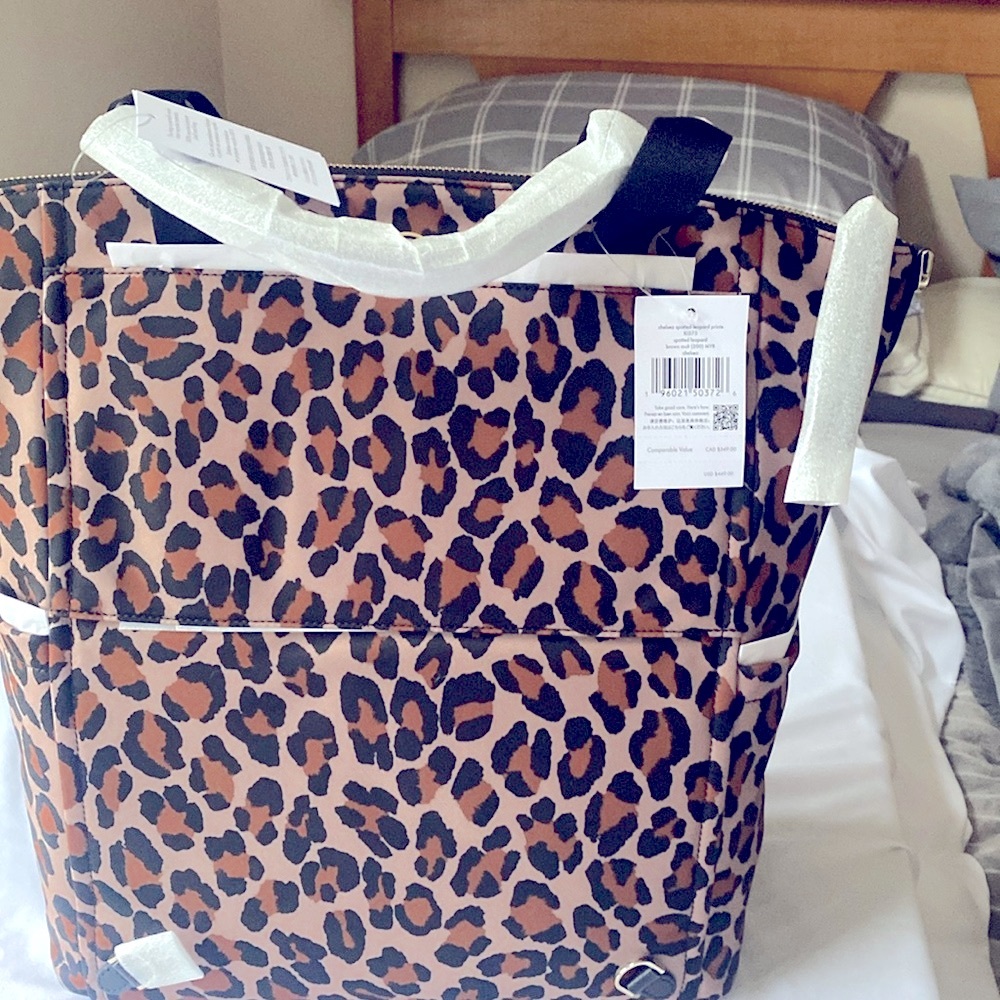 This is a brand new Kate Spade very spacious backpack
